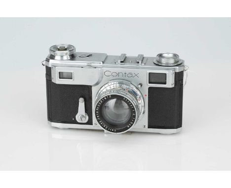 A Zeiss Ikon Contax II Rangefinder Camera, A Zeiss Ikon Contax II Rangefinder Camera,chrome, serial no. G7569, with Carl Zeis