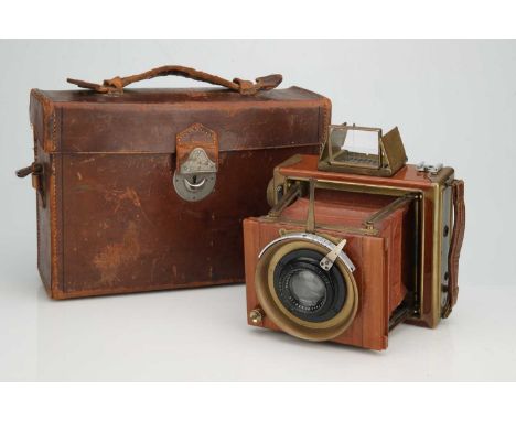 An Ernemann Tropical Klapp Camera, An Ernemann Tropical Klapp Camera,brass &amp; teak, body G-VG, shutter untested, shutter c