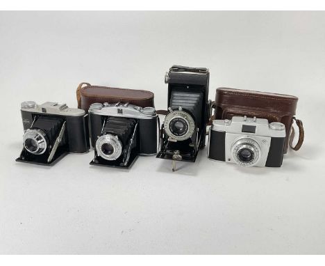 A Selection of Cameras, A Selection of Cameras,Including an Adox golf, an Agfa Isolette II, a Kodak Six-20 Folding Brownie, a