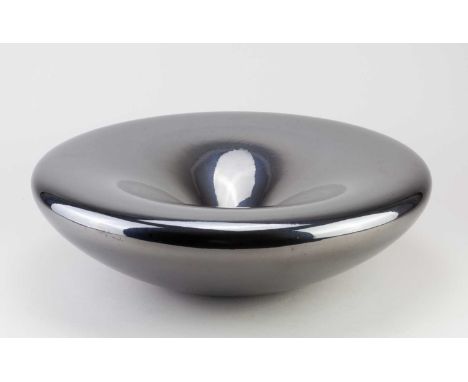 MICHAEL EDEN (born 1955); 'Event Horizon', a sanitary ware clay bowl form covered in glossy metallic glaze, diameter 46cm, he