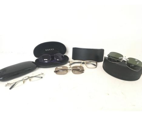 Designer glasses and sunglasses by Gucci, Porsche, Cerruti, Fred and Fendi. Some cased