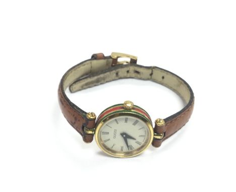 A vintage ladies Gucci watch.