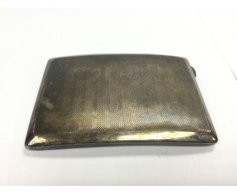 A silver cigarette case, Birmingham hallmarks.