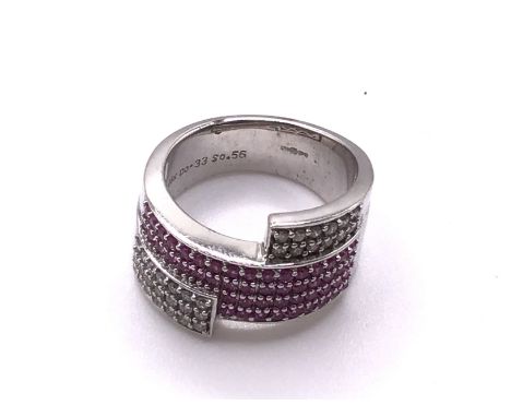 An 18ct white gold diamond and pink sapphire set ring, Size M, Approx 12g,