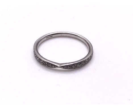 A platinum and diamond twist design ring, Size O, (A