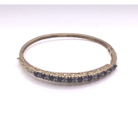 9ct gold sapphire/diamond bangle, approx 12.6g (A)