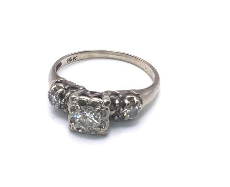 14ct White Gold 3 Stone Diamond Ring. Weight 2.9gm. Size O.