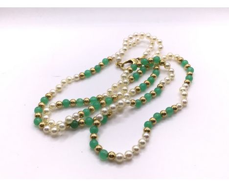 An 18ct gold, Jade and pearl necklace.