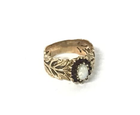 An Opel &amp; garnet ring, size L, 3.7g