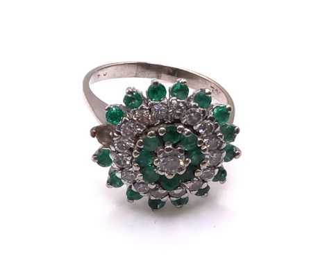 An 18ct gold emerald and diamond cluster ring (1 stone loose) size O, (A).