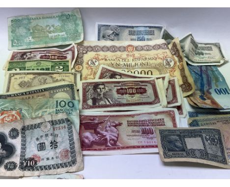 A collection of vintage banknotes.