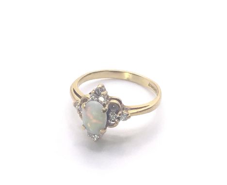 18ct Gold Opal/Diamond Cluster Ring. Weight 3.3gm. Size L.