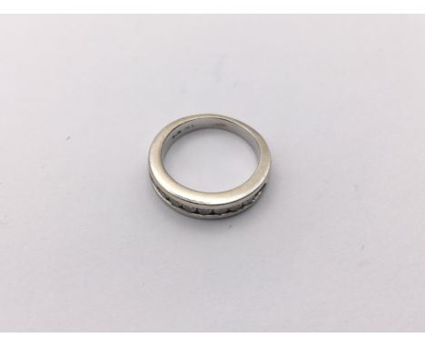 14ct white gold channel set diamond 1/2 loop ring, size K, 4.7gm approx. (A)