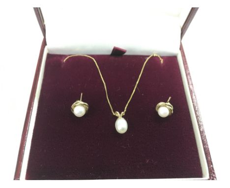 A pair of gold and pearl ear studs together with a matching necklace, approx total weight 2.7g. - NO RESERVE