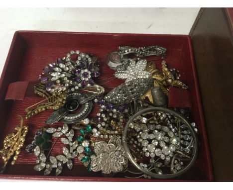 Leather case of vintage costume jewellery