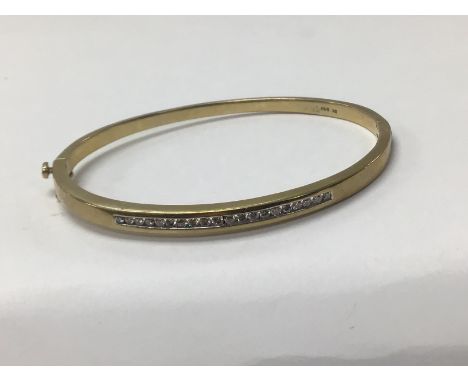 9ct gold diamond bangle ( 0.50ct diamonds) (A) 13.7g