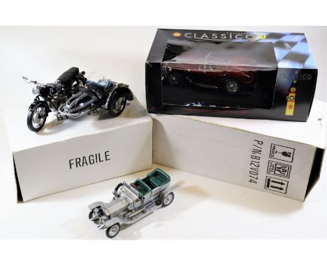 4 Franklin Mint 1:24 scale models. 1907 Rolls Royce Silver Ghost in silver. 1957 BMW R-50 motorcycle in black. 1957 BMW motor