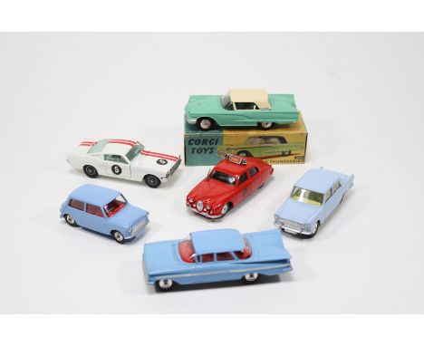 6 Corgi Toys Cars. Ford Thunderbird (214). In pale green with cream roof and no interior, boxed- some wear overall. Plus a Ja