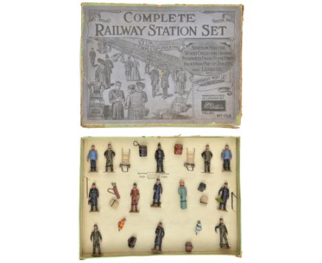 A Britains Complete Railway Station Set (Set 158). Comprising of 13 figures and 12 accessories. Station Master, Ticket Collec