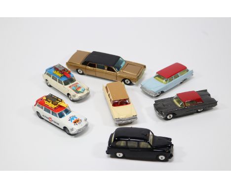 7 Corgi Toys. Lincoln Continental Limousine in metallic gold with black roof and red interior, with battery pack complete. Au