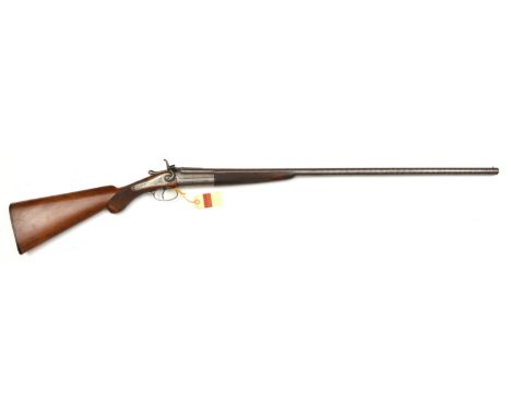 *An SB 20 bore x 2½” top lever hammer gun, 47” overall, nicely browned nitro proved (1975) damascus barrel 30” engraved at th