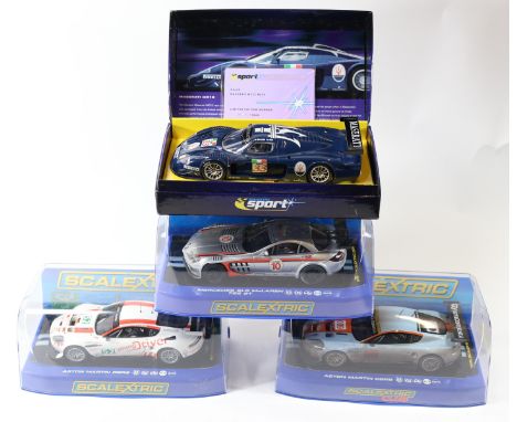 4 2000's issue Scalextric slot racing cars. 2x Aston Martin DBR9- (C2965) in Gulf racing colours, light blue/orange RN009 and