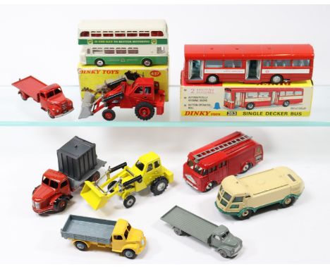 10 Dinky Toys. A London Transport Red Arrow Single Decker Bus (283). Example in bright red with pale blue interior, boxed wit