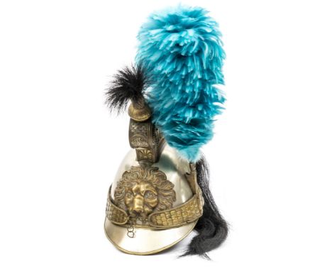 A mid 19th century Belgian cavalry trooper’s helmet, white metal skull and peaks with brass edging, brass comb with ornamenta