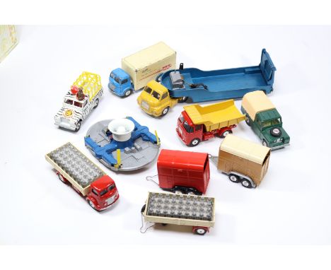 9 Corgi Toys. Bedford 'S' tractor unit and Carrimore machinery carrier in yellow and metallic blue. An ERF Model 64G Tipper i