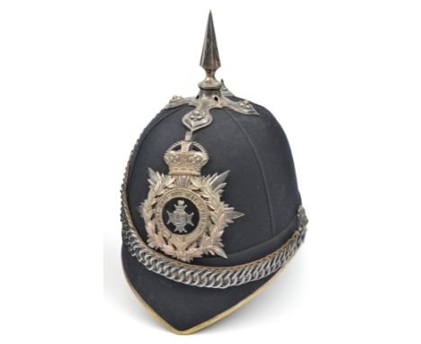 A good pre 1908 officer’s blue cloth spiked helmet of the Cinque Ports Volunteer Battalion The Royal Sussex Regiment, silver 