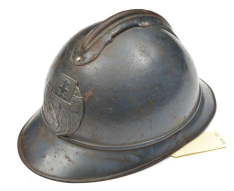 A scarce WWI Czech Legion “Adrian” pattern steel helmet, with grey/blue finish, pressed steel badge and leather lining and ch