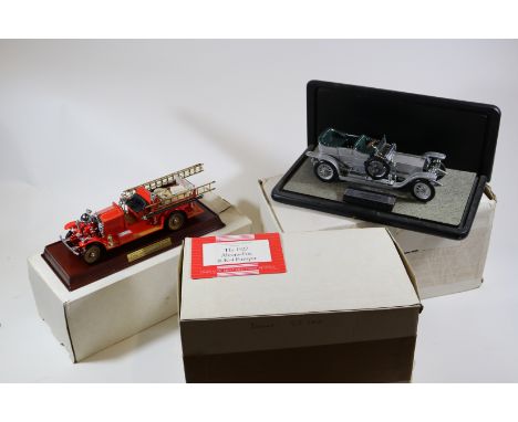 4 Franklin Mint scale models. A 1:24 scale 1907 Rolls Royce Silver Ghost in silver. A 1:32 1922 Ahrens-Fox Fire Engine R-K-4 