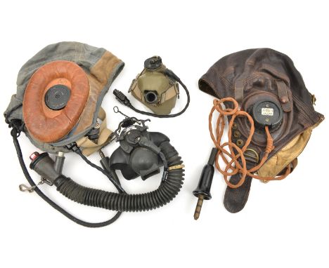 An RAF Type C leather flying helmet, with earphones AM10A, and oxygen mask; and a grey linen 22c flying helmet with large pad