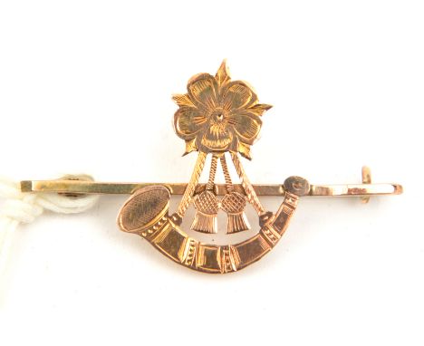 A 9ct gold sweetheart tie pin of the 6th Bn The King’s (Liverpool Regt),  a bugle surmounted by the Rose of Lancaster. GC Pla