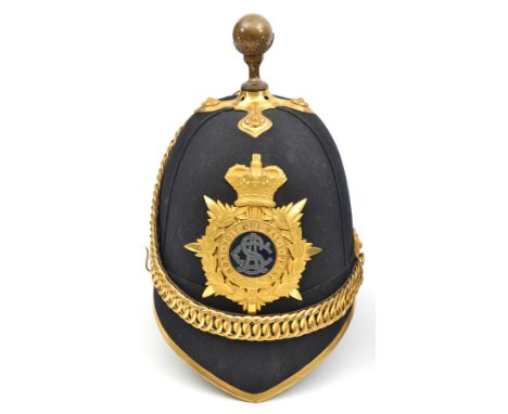 A good Victorian officer’s blue cloth ball topped helmet of the Army Service Corps, gilt peak binding, ball top and mount, ve