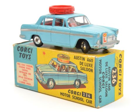 Corgi Toys Austin A60 De Luxe Saloon Motor School Car (236). In light blue with silver flash, red plastic wheel to roof, red 