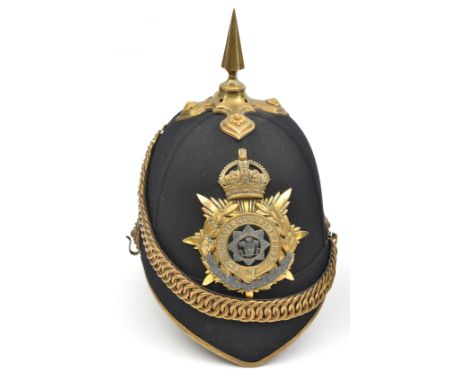 A post-1902 officer’s blue cloth spiked helmet of The Cheshire Regiment, with peak binding, top mount and spike, velvet backe