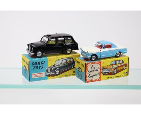 2 Corgi Toys Triumph Herald Coupe (231). Example in light blue and white with red interior, spun wheels and black rubber tyre