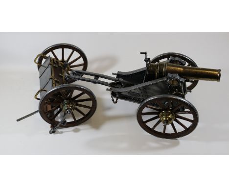 A model of the Spanish 'Mortero 1895' field gun with limber. A Spanish made model of steel and brass construction and wooden 