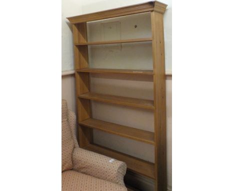 A modern Pine six shelf open bookcase