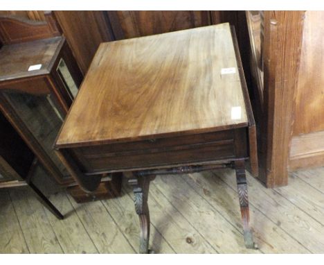 A Mahogany rising top sofa table with four inner fitted compartments for tea and two for blending bowls, lock by Bramah, Lond