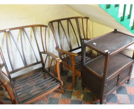 A pair of Ercol style armchairs (without cushions), a Loom linen basket, a chair and a tea trolley