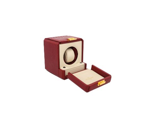 PATEK PHILIPPE Uhrenbeweger für eine Uhr. Rotes Leder mit goldenem Schriftzug/Logo. Sehr guter Zustand, Gebrauchsspuren.| SCA