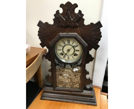 Two hole American clock with a bird and landscape design glass front, complete with pendulum and key 