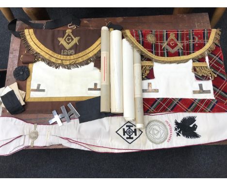 A Collection of masonic aprons, sash and various certificates, Comes with carry case. 1295 apron, Tartan apron depicting sun 