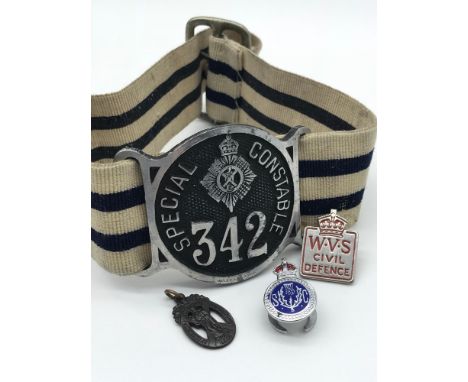A mixed lot to include; Special Constable armband, St Andrews Ambulance badge, Police metal badge &amp; Women's voluntary ser