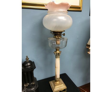 A Victorian corinthian column paraffin lamp. Made from glass, onyx & brass. 