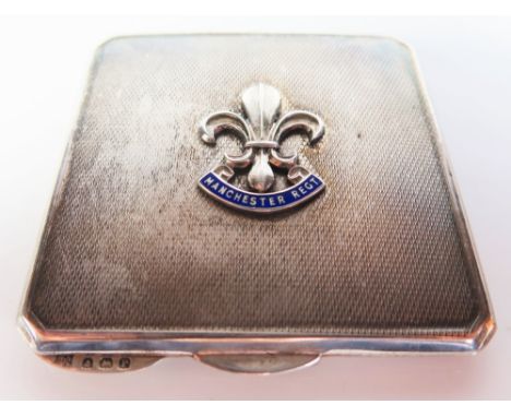 A George V Silver Manchester Regiment Engine Turned Compact with enameled plaque, Birmingham 1939