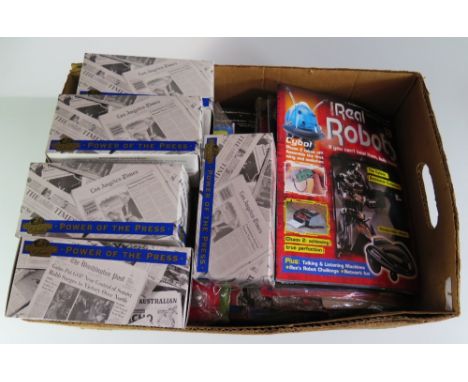A Collection of Six Matchbox Models of Yesteryear Die Cast Vehicles and Real Robot Magazines