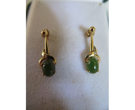A Pair of 18ct Gold and Jade Earrings